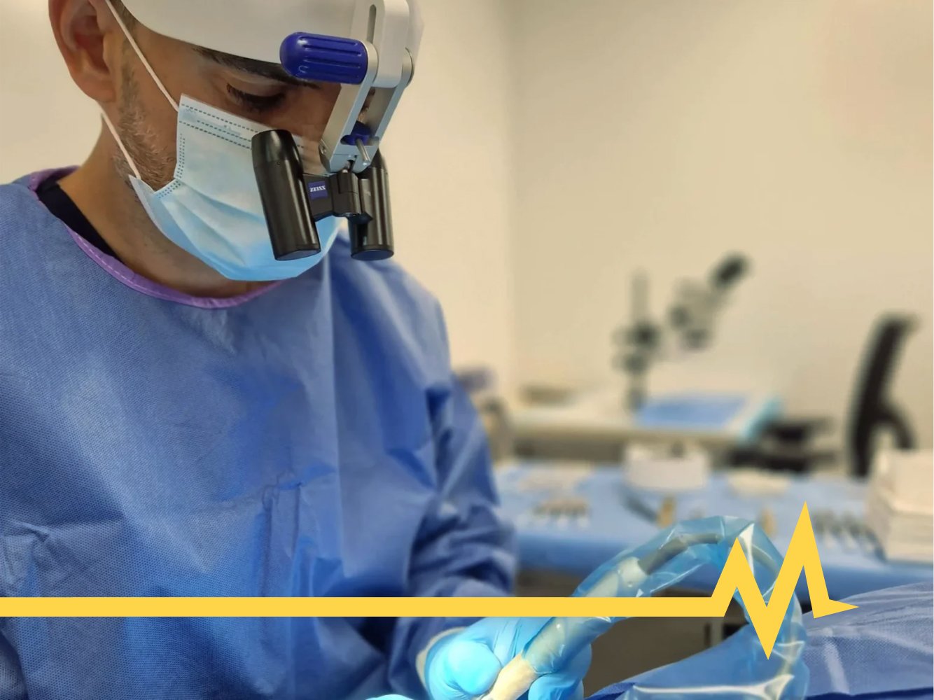 Dr Bonaros operating under surgical loupes