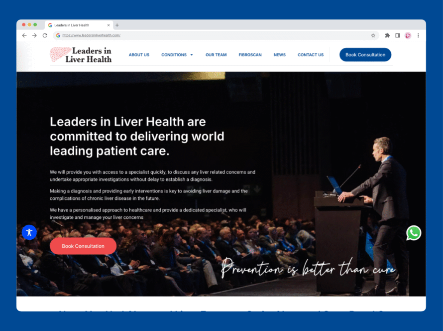 A man in a suit speaks at a lectern on stage to a seated audience in an auditorium. The website shown is for Leaders in Liver Health, with information about liver disease patient care, navigation links, and a prominent Book Consultation button.