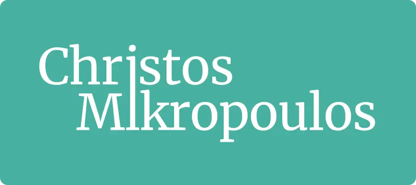 White text reading “Christos Mikropoulos” is centred on a teal background. The font is serif, with Christos on the top line and Mikropoulos on the bottom line, both aligned to the left. The corners of the background are rounded.